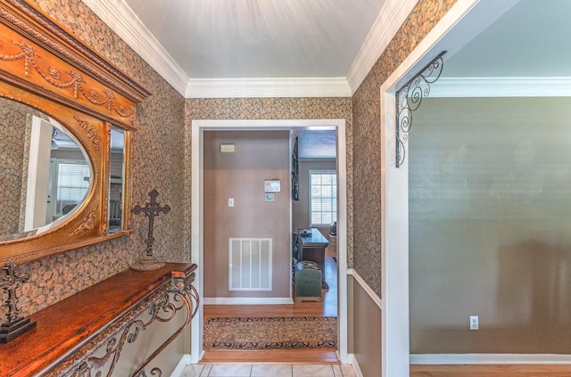 410 Shadywood Cir, Conroe, TX 77304 - entryway featuring crown molding and wallpapered walls