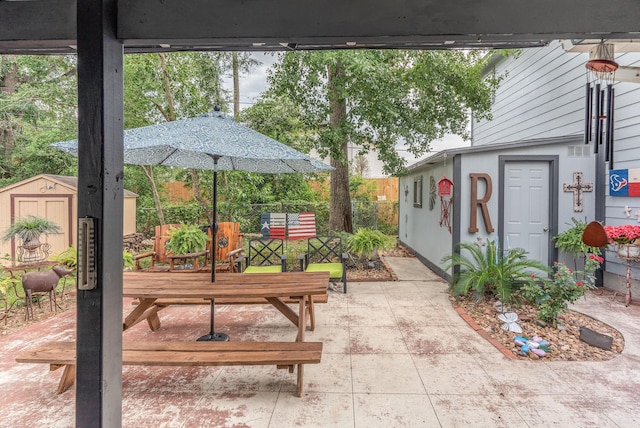 410 Shadywood Cir, Conroe, TX 77304 - view of patio featuring a shed