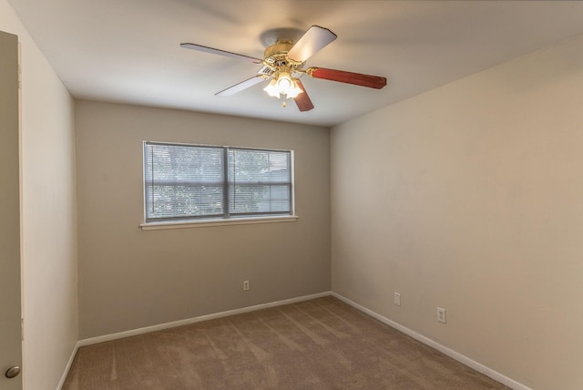 410 Shadywood Cir, Conroe, TX 77304 - carpeted empty room with baseboards and a ceiling fan
