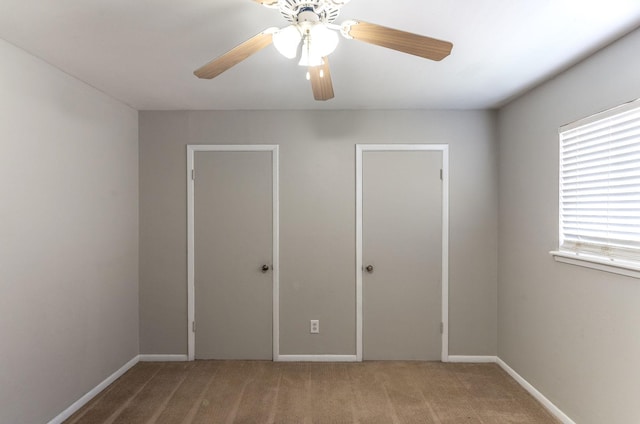 410 Shadywood Cir, Conroe, TX 77304 - unfurnished bedroom featuring carpet floors and ceiling fan