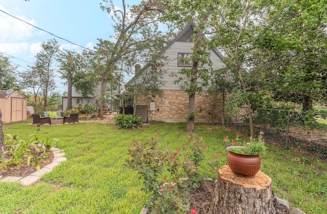 410 Shadywood Cir, Conroe, TX 77304 - view of yard with a storage unit and outdoor lounge area