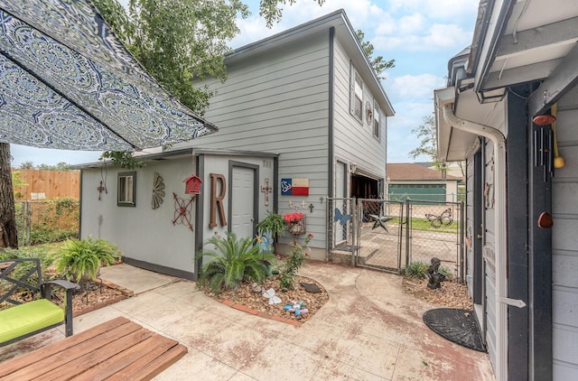 410 Shadywood Cir, Conroe, TX 77304 - rear view of property featuring a gate
