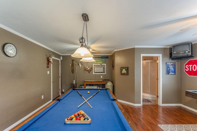 410 Shadywood Cir, Conroe, TX 77304 - recreation room featuring wood finished floors, billiards table, crown molding, ceiling fan, and a wall mounted air conditioner