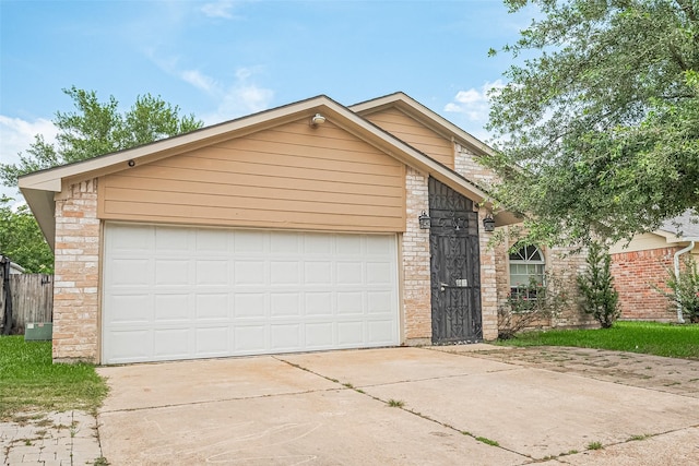 511 Walston Ln, Houston, TX 77060 - view of front of home featuring driveway and brick siding