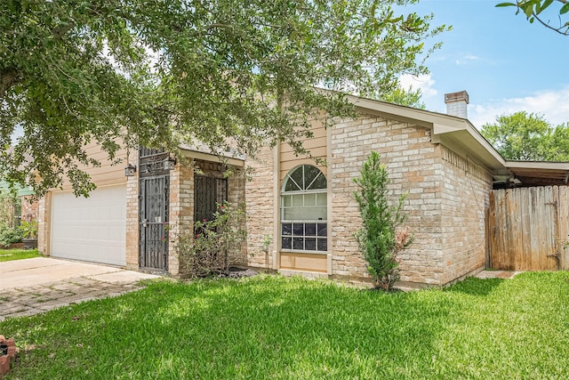 511 Walston Ln, Houston, TX 77060 - view of front of property featuring a chimney and concrete driveway