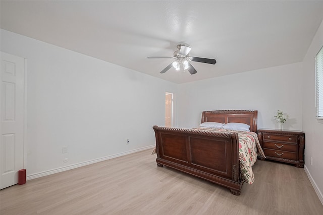 511 Walston Ln, Houston, TX 77060 - bedroom featuring light wood finished floors, ceiling fan, and ensuite bath