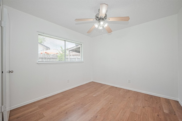 511 Walston Ln, Houston, TX 77060 - spare room featuring light wood finished floors and ceiling fan