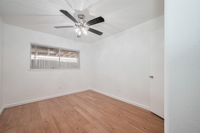 511 Walston Ln, Houston, TX 77060 - empty room featuring light wood-type flooring, a textured ceiling, and a ceiling fan