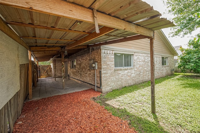 511 Walston Ln, Houston, TX 77060 - view of side of home with a patio, a fenced backyard, and brick siding