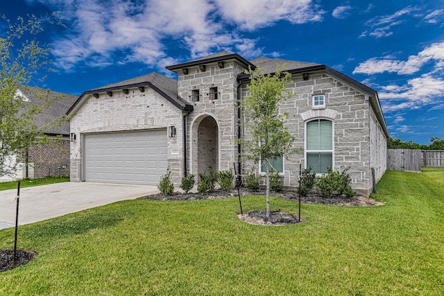 14715 Poplar Lake Trl, Cypress, TX 77429 - french country inspired facade with stone siding, an attached garage, driveway, and a shingled roof