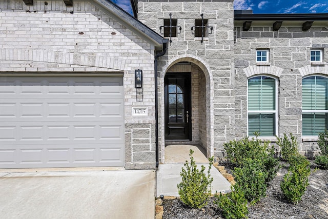 14715 Poplar Lake Trl, Cypress, TX 77429 - entrance to property with stone siding, driveway, and an attached garage