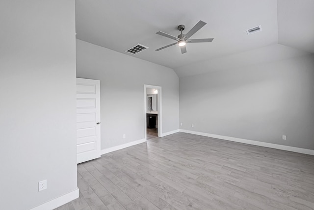14715 Poplar Lake Trl, Cypress, TX 77429 - unfurnished bedroom featuring lofted ceiling, wood finished floors, ensuite bathroom, and a ceiling fan