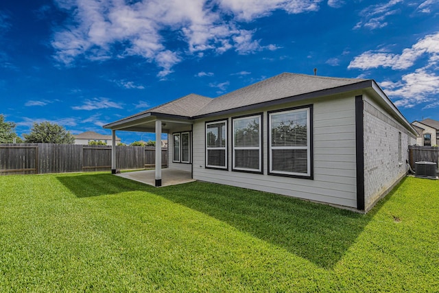 14715 Poplar Lake Trl, Cypress, TX 77429 - back of house featuring a patio and a fenced backyard