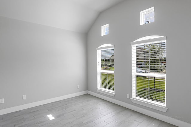 14715 Poplar Lake Trl, Cypress, TX 77429 - unfurnished room featuring lofted ceiling and wood finished floors