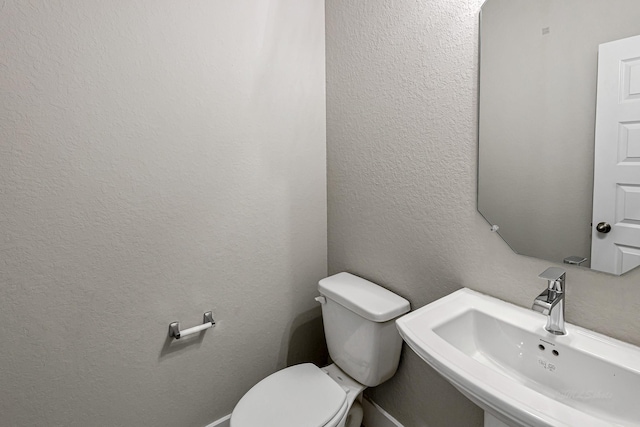 14715 Poplar Lake Trl, Cypress, TX 77429 - bathroom with a sink and a textured wall
