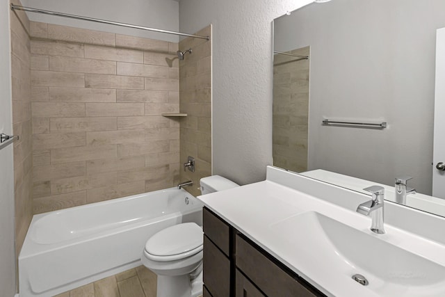 14715 Poplar Lake Trl, Cypress, TX 77429 - bathroom with shower / washtub combination, vanity, a textured wall, and wood finished floors