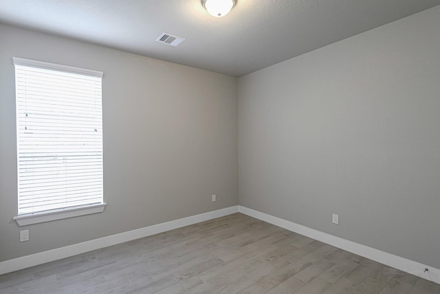 14715 Poplar Lake Trl, Cypress, TX 77429 - unfurnished room featuring light wood-style floors and healthy amount of natural light