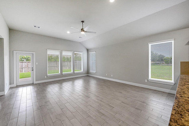 14715 Poplar Lake Trl, Cypress, TX 77429 - spare room with a ceiling fan, wood finished floors, vaulted ceiling, and recessed lighting