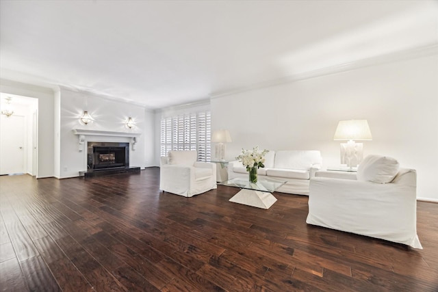 9333 Memorial Dr Unit 301, Houston, TX 77024 - living area with a fireplace with raised hearth, wood finished floors, a chandelier, and ornamental molding