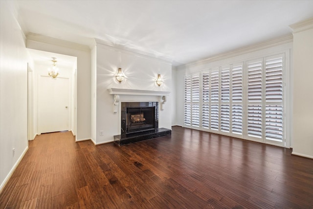9333 Memorial Dr Unit 301, Houston, TX 77024 - unfurnished living room featuring ornamental molding, wood finished floors, a fireplace, and a chandelier