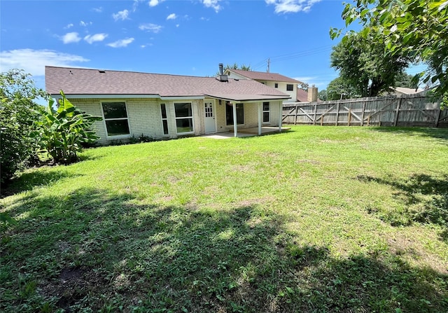 5030 Glenvalley Dr, La Porte, TX 77571 - back of house featuring a patio area, a fenced backyard, and brick siding