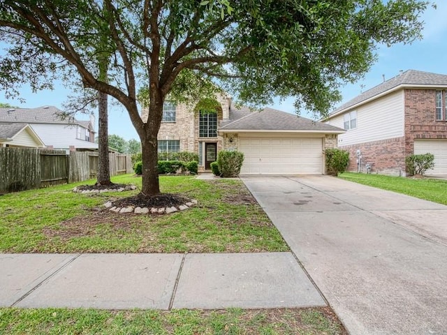 26610 W Surrey Park Ln W, Katy, TX 77494 - traditional-style home featuring a garage and driveway