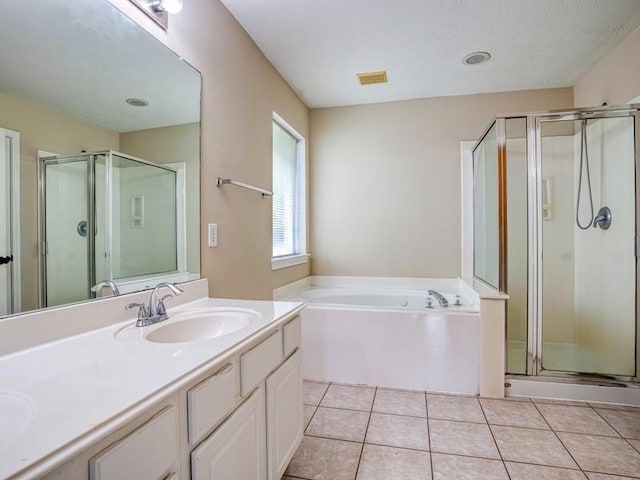 26610 W Surrey Park Ln W, Katy, TX 77494 - full bathroom with a shower stall, double vanity, a bath, and tile patterned flooring