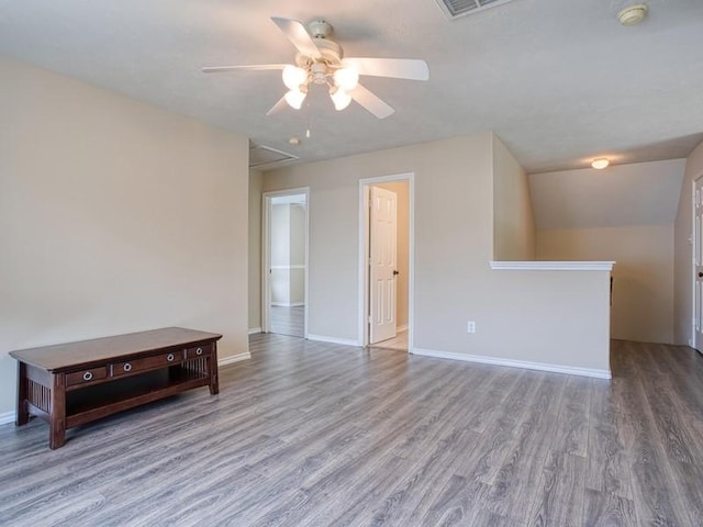26610 W Surrey Park Ln W, Katy, TX 77494 - empty room featuring ceiling fan, wood finished floors, a smoke detector, and attic access