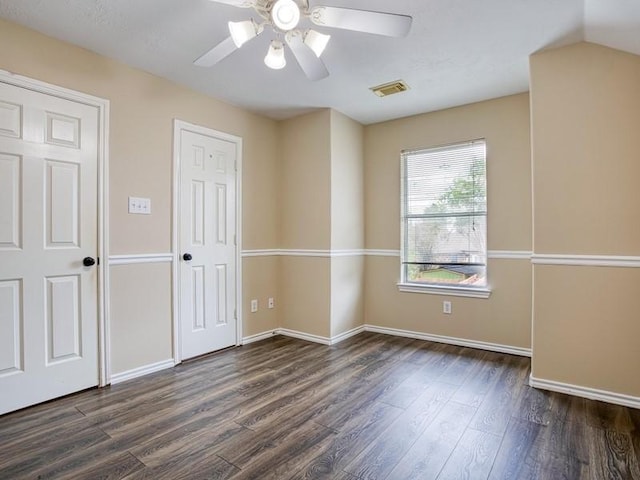 26610 W Surrey Park Ln W, Katy, TX 77494 - unfurnished bedroom featuring dark wood finished floors and ceiling fan