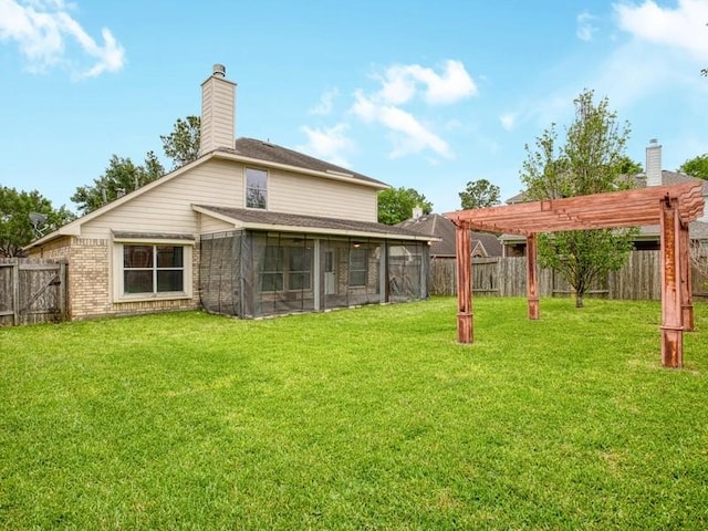 26610 W Surrey Park Ln W, Katy, TX 77494 - back of property featuring a fenced backyard, a sunroom, a pergola, and a chimney
