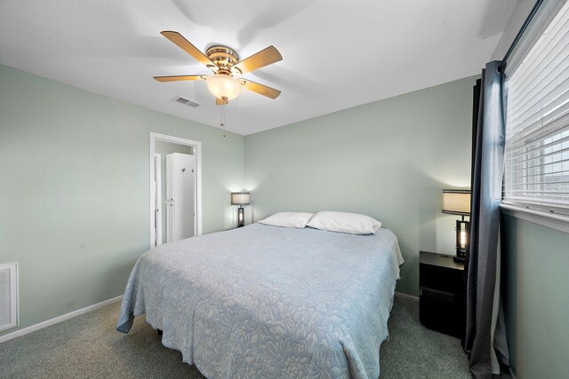8416 Seawall Blvd Unit 5, Galveston, TX 77554 - carpeted bedroom featuring baseboards and a ceiling fan