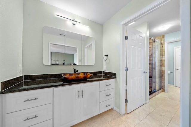 8416 Seawall Blvd Unit 5, Galveston, TX 77554 - full bath featuring vanity, a stall shower, and marble finish flooring