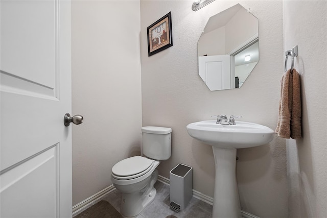 16330 Hillside Garden Ln, Houston, TX 77084 - half bath with toilet and tile patterned floors