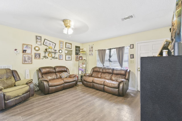 1732 Lynn Ln, Freeport, TX 77541 - living area with wood finished floors and ceiling fan