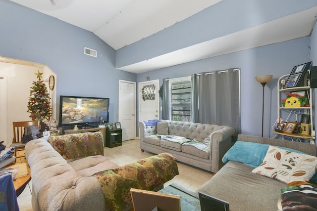 1732 Lynn Ln, Freeport, TX 77541 - tiled living area featuring high vaulted ceiling