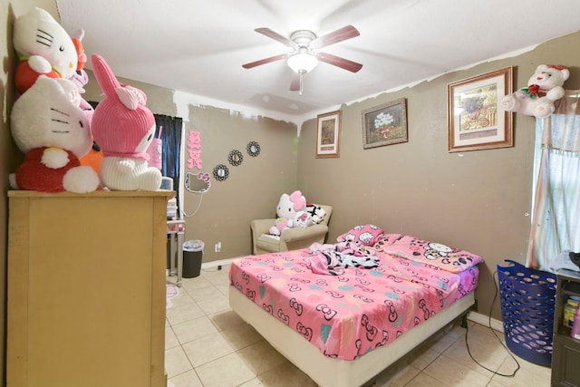 1732 Lynn Ln, Freeport, TX 77541 - bedroom featuring light tile patterned flooring and a ceiling fan