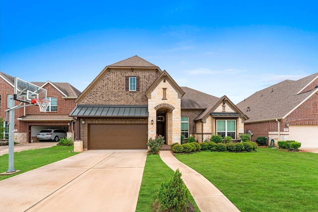 4110 Willow Wind Ct, Sugar Land, TX 77479 - view of front facade with a standing seam roof, a front lawn, concrete driveway, brick siding, and an attached garage