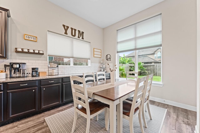 4110 Willow Wind Ct, Sugar Land, TX 77479 - dining space featuring light wood finished floors and baseboards