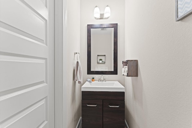 4110 Willow Wind Ct, Sugar Land, TX 77479 - bathroom with vanity and a textured wall