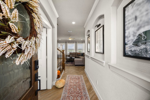 915 Bernard Meadows Dr, East Bernard, TX 77435 - hallway with ornamental molding, stairs, recessed lighting, a textured ceiling, and wood finished floors