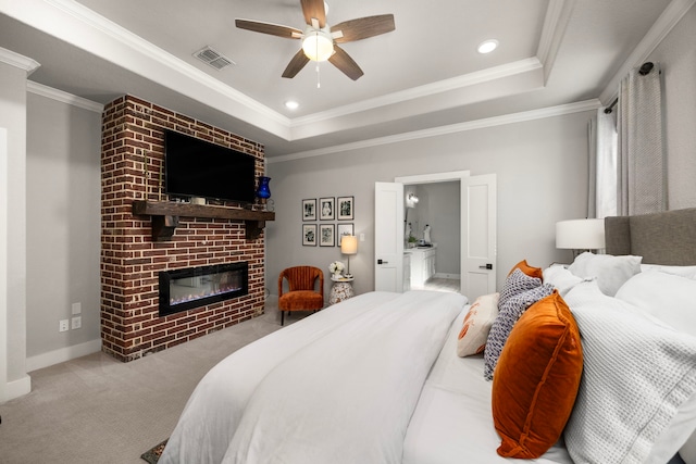 915 Bernard Meadows Dr, East Bernard, TX 77435 - bedroom with a raised ceiling, carpet floors, ornamental molding, a brick fireplace, and ensuite bathroom