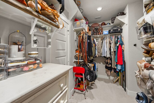 915 Bernard Meadows Dr, East Bernard, TX 77435 - walk in closet featuring carpet flooring
