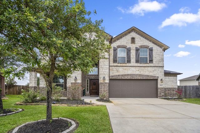 31767 Chapel Rock Ln, Spring, TX 77386 - french country inspired facade featuring stone siding, concrete driveway, and a garage