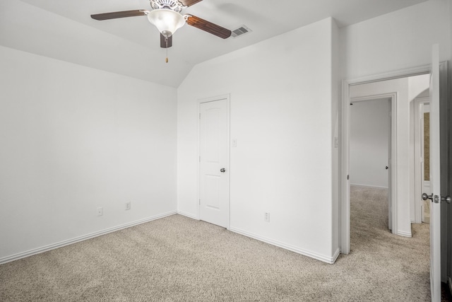 31767 Chapel Rock Ln, Spring, TX 77386 - unfurnished bedroom featuring light carpet, vaulted ceiling, and ceiling fan