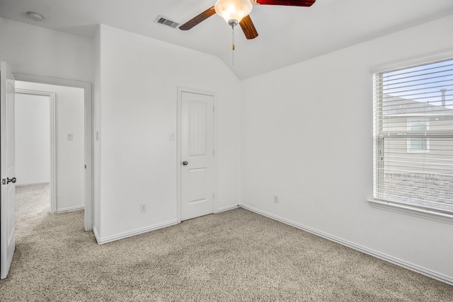 31767 Chapel Rock Ln, Spring, TX 77386 - unfurnished bedroom featuring carpet floors, lofted ceiling, and ceiling fan