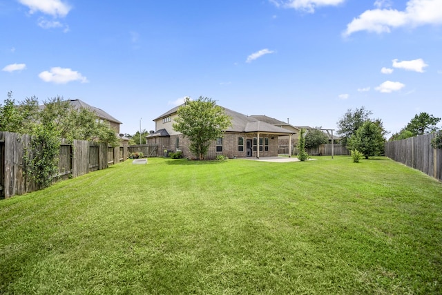 31767 Chapel Rock Ln, Spring, TX 77386 - fenced backyard featuring a patio