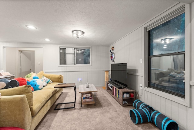 111 Mesa Ct, Conroe, TX 77304 - living room with carpet floors and a textured ceiling