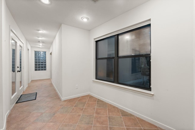 111 Mesa Ct, Conroe, TX 77304 - corridor featuring baseboards