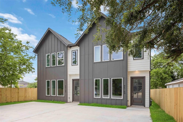 8618 Lee Otis St A-B, Unit A-B Houston, TX 77051 - view of front of property with board and batten siding and a patio