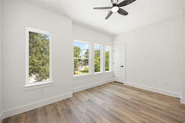 8618 Lee Otis St A-B, Unit A-B Houston, TX 77051 - spare room featuring plenty of natural light, a ceiling fan, and wood finished floors